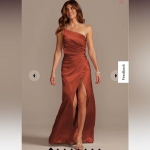 Never worn dress from David’s Bridal. No alterations done!